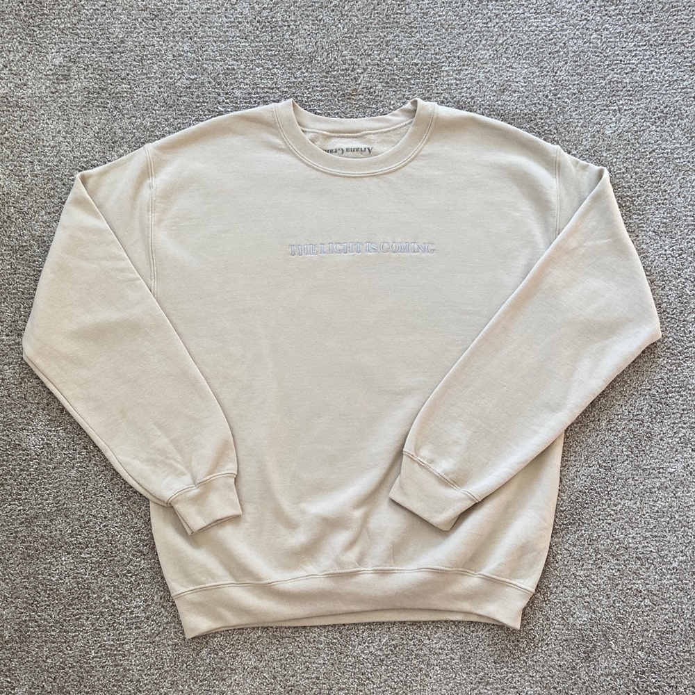 Ariana Grande the light is coming crewneck